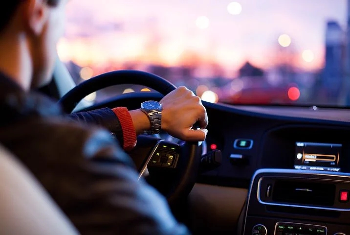 A man driving with a focus 