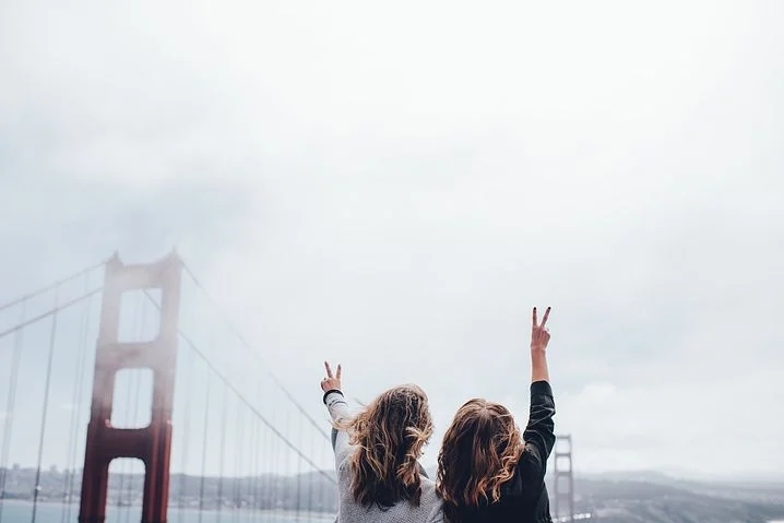 Two women staying together and feeling happy 