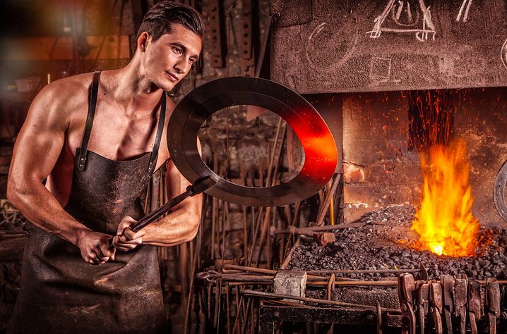 A blacksmith working hard to earn a living 