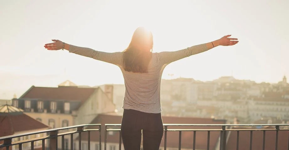 A woman basking in the morning sun