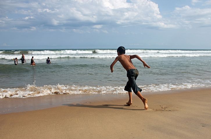 A boy going swimming 