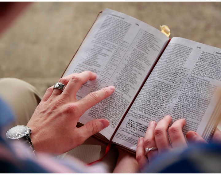 A man reading scriptures